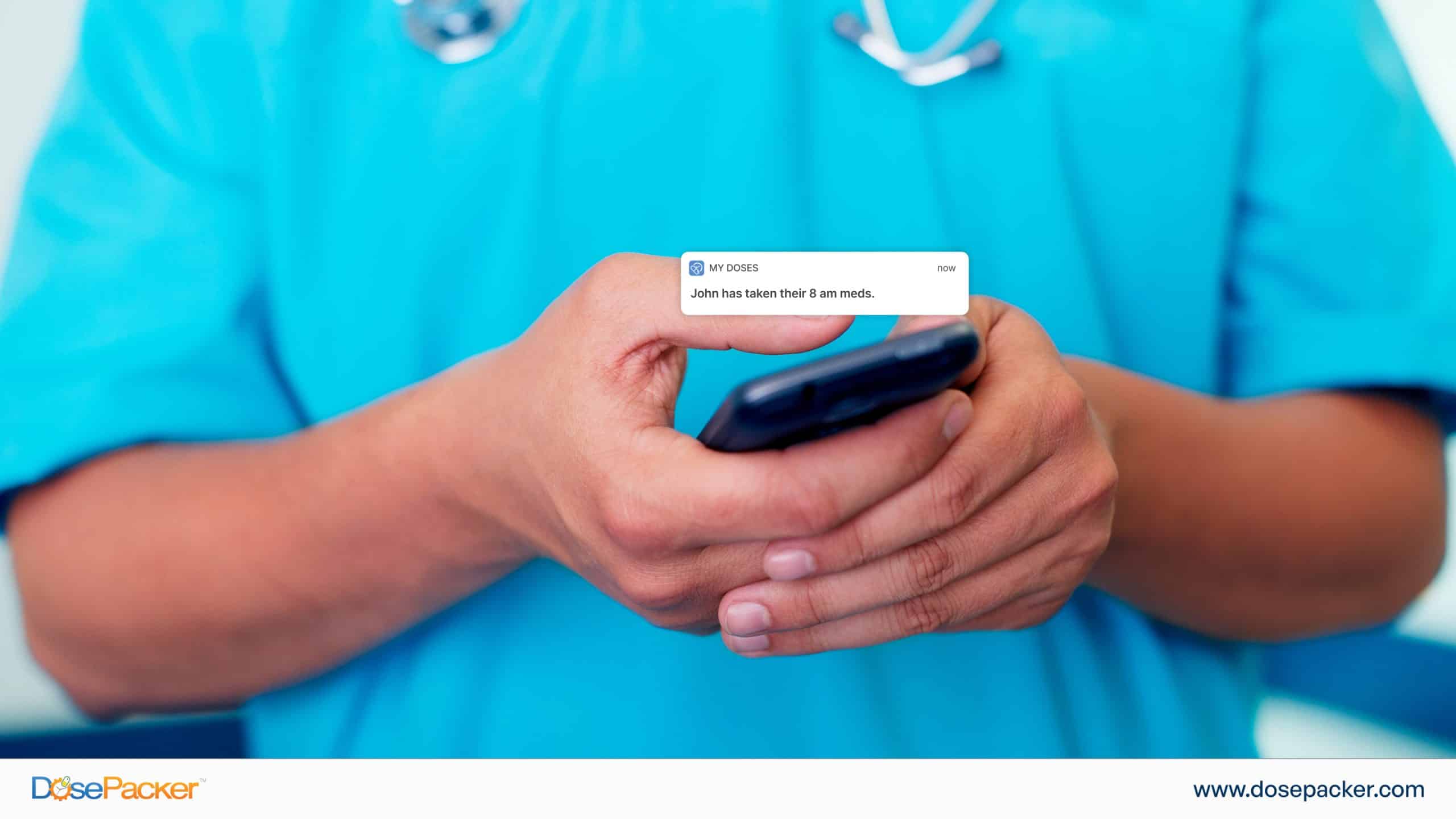 A caregiver receiving an alert on their phone